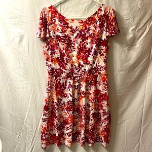 This is a very elegant London Times size 12 pink, red and orange flowered dress.